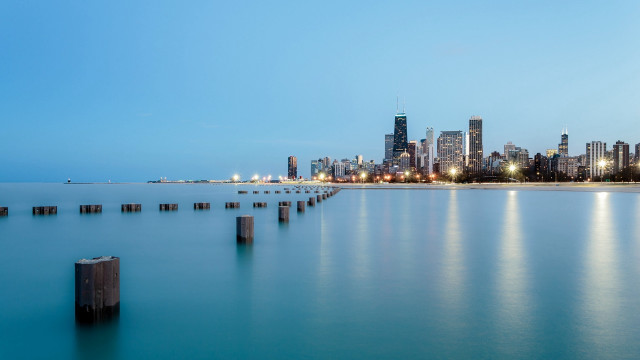 City skyline water wooden posts free wallpaper for desktop - medium preview image