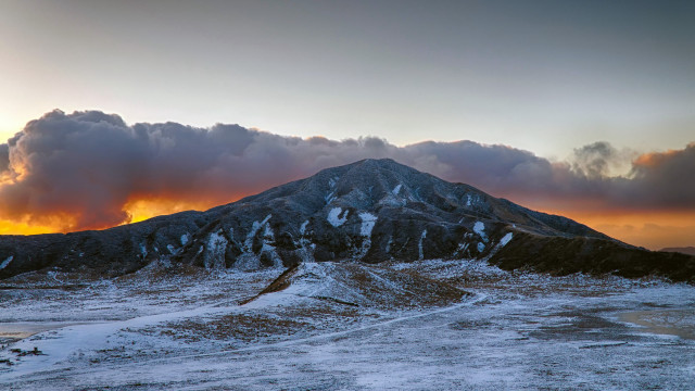 Mountain snowy ground cloudy sky free wallpaper for desktop - medium preview image