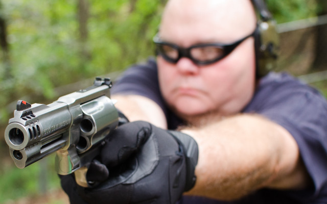 Male aiming gun gloves glasses free wallpaper for desktop - medium preview image