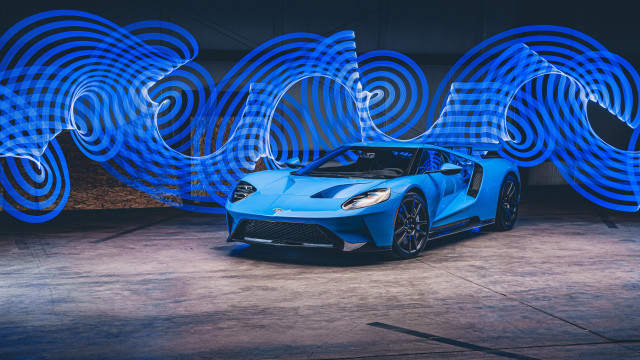 Blue sports car garage spiral free wallpaper for desktop - medium preview image