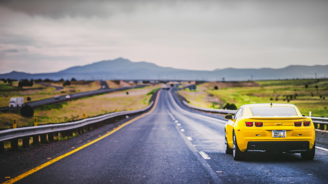 Yellow sports car country road #2 free wallpaper for desktop - medium preview image