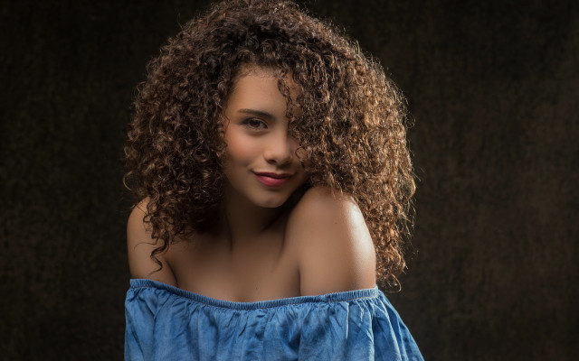Woman curly hair blue offshoulder free wallpaper for desktop - medium preview image