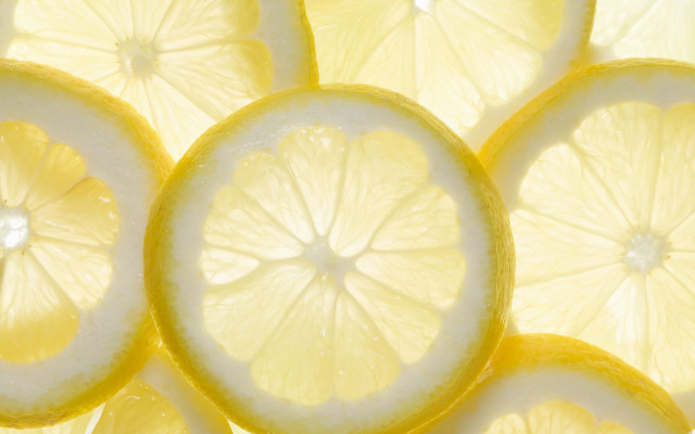 Lemon slice closeup tabletop background free wallpaper for desktop - medium preview image
