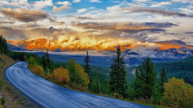 Mountain road clouds trees sunset free wallpaper for desktop - medium preview image