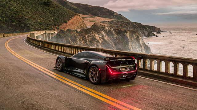 Black sports car ocean cliff free wallpaper for desktop - medium preview image