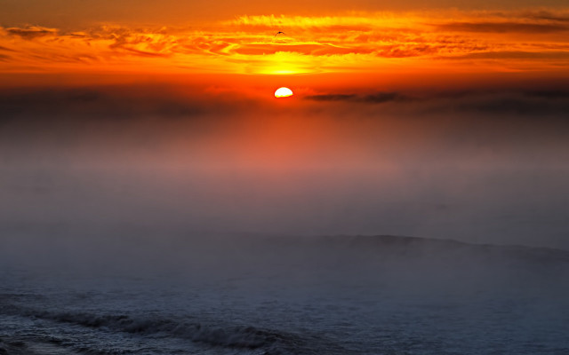 Sunset foggy ocean boat matte free wallpaper for desktop - medium preview image