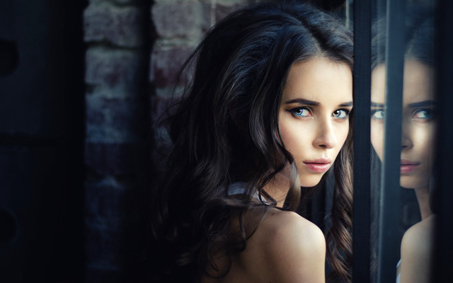 Woman window brick wall blue free wallpaper for desktop - medium preview image