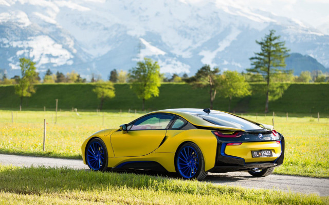 Yellow sports car mountain landscape free wallpaper for desktop - medium preview image