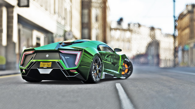 Green sports car city street #5 free wallpaper for desktop - medium preview image