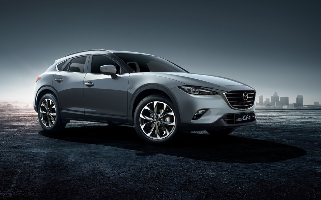 Silver mazda city skyline night free wallpaper for desktop - medium preview image