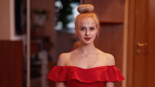 Woman red dress bun blonde free wallpaper for desktop - medium preview image