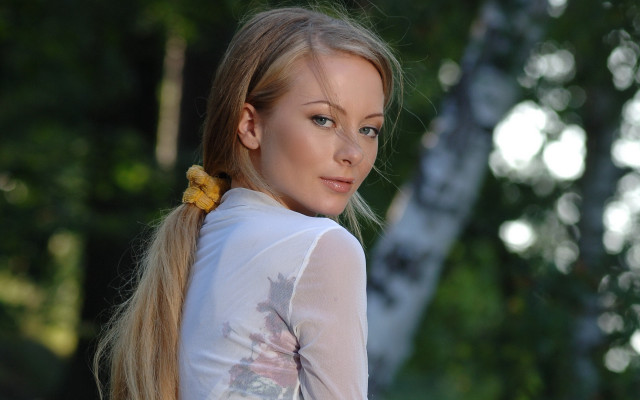 Woman ponytail flower white shirt free wallpaper for desktop - medium preview image