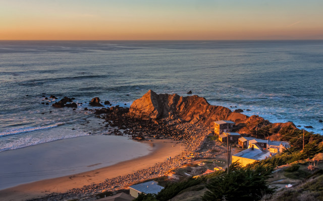 Beach house cliff sunset ocean free wallpaper for desktop - medium preview image