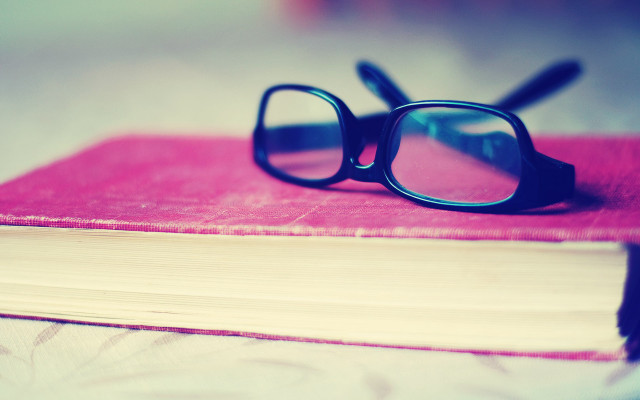 Glasses on book outdoor beach free wallpaper for desktop - medium preview image