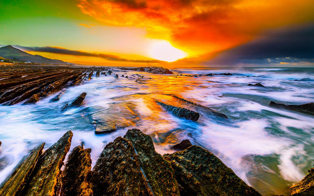 Sunset rocky beach waves mountain free wallpaper for desktop - medium preview image