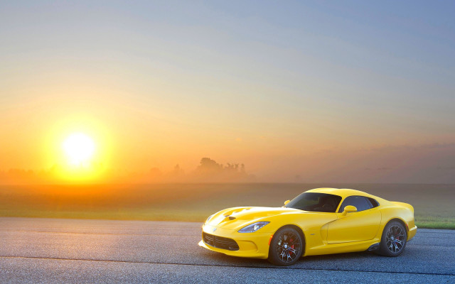 Yellow sports car sunset sun free wallpaper for desktop - medium preview image