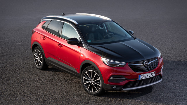 Red opel suv parking black free wallpaper for desktop - medium preview image