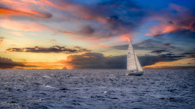 Sailboat ocean sunset cloudy sky #8 free wallpaper for desktop - medium preview image