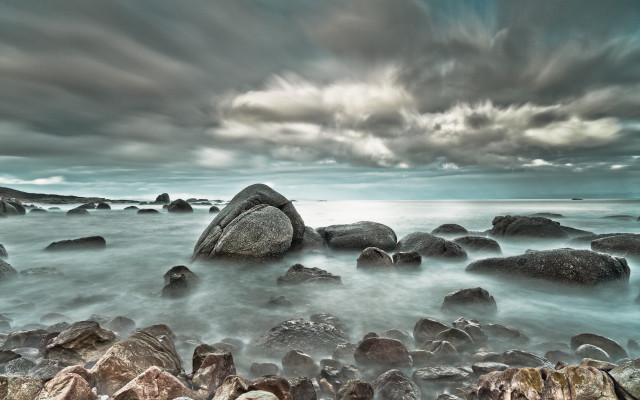 Rocky beach large rock cloudy free wallpaper for desktop - medium preview image