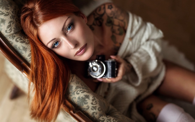 Woman camera tattoo laying bokeh free wallpaper for desktop - medium preview image