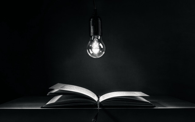 Book lightbulb table black background free wallpaper for desktop - medium preview image