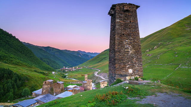 Tall tower hillside valley road free wallpaper for desktop - medium preview image