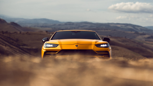 Yellow sports car mountains clouds free wallpaper for desktop - medium preview image