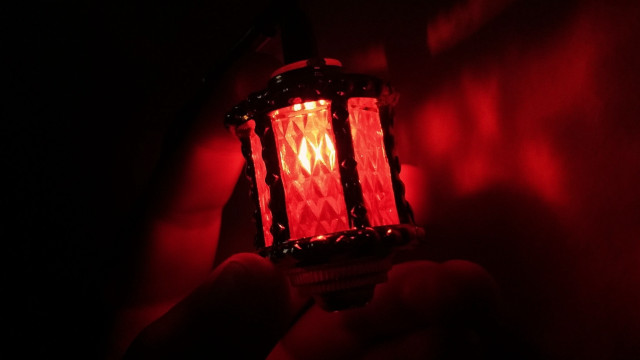 Red light holding portrait rembrandt free wallpaper for desktop - medium preview image