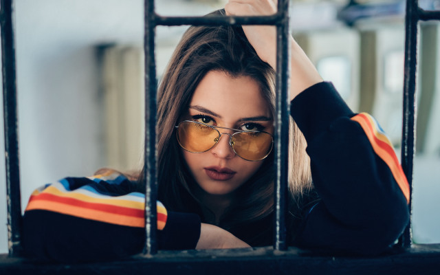 Woman glasses jail cell portrait free wallpaper for desktop - medium preview image