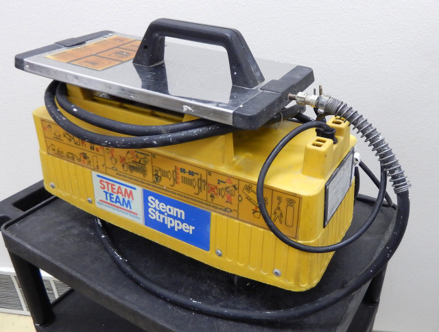 Yellow black machine handle white free wallpaper for desktop - medium preview image