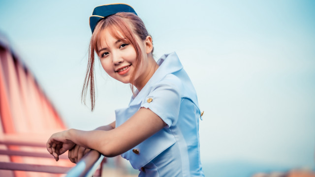 Girl sailor smile blurry background free wallpaper for desktop - medium preview image