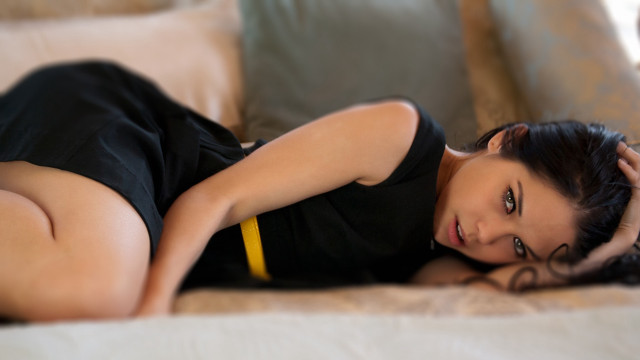 Woman laying bed blurry solo free wallpaper for desktop - medium preview image