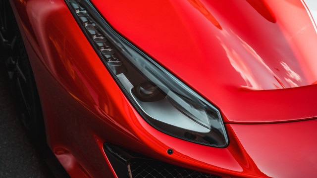 Red sports car front grill free wallpaper for desktop - medium preview image