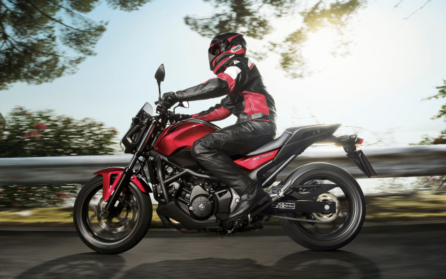 Red motorcycle rider outdoors leather free wallpaper for desktop - medium preview image