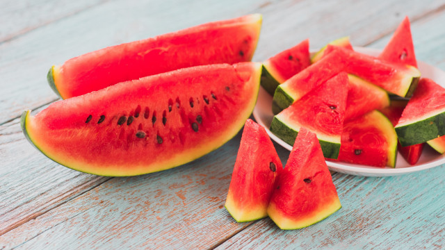 Watermelon slices wooden table bowl free wallpaper for desktop - medium preview image