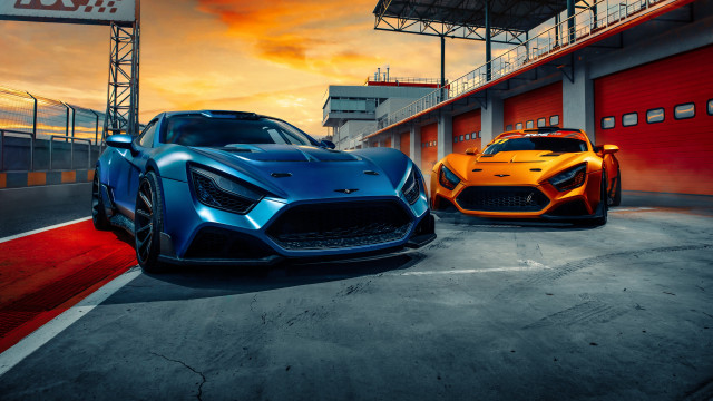 Two sports cars sunset red free wallpaper for desktop - medium preview image