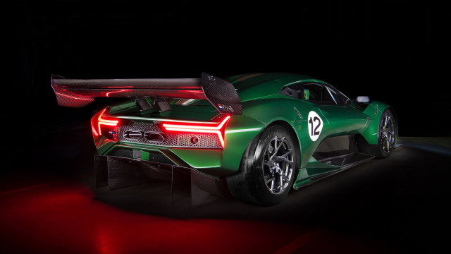 Green sports car red taillight free wallpaper for desktop - medium preview image