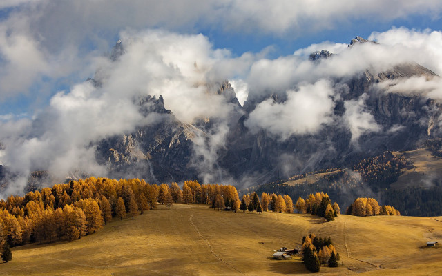 Mountain range trees houses clouds free wallpaper for desktop - medium preview image