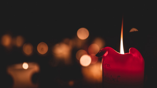 Candle red candleholder blurry background free wallpaper for desktop - medium preview image