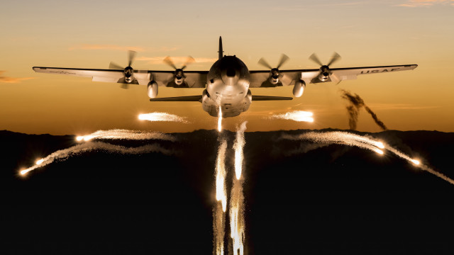 Airplane smoke sunset beach ocean free wallpaper for desktop - medium preview image