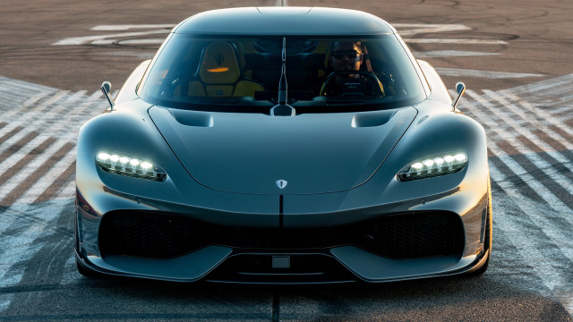 Silver sports car track person free wallpaper for desktop - medium preview image