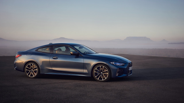 Silver car mountains fog promotional free wallpaper for desktop - medium preview image