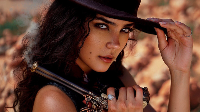 Woman hat gun rocks grass free wallpaper for desktop - medium preview image