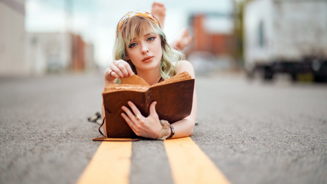 Woman reading blonde portrait bokeh free wallpaper for desktop - medium preview image