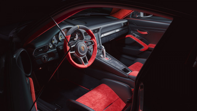 Romanesque red leather car puzzle free wallpaper for desktop - medium preview image