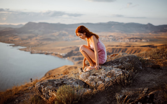 Woman rock water mountains sky free wallpaper for desktop - medium preview image