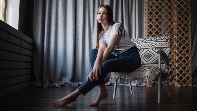 Woman sitting room cushion portrait free wallpaper for desktop - medium preview image