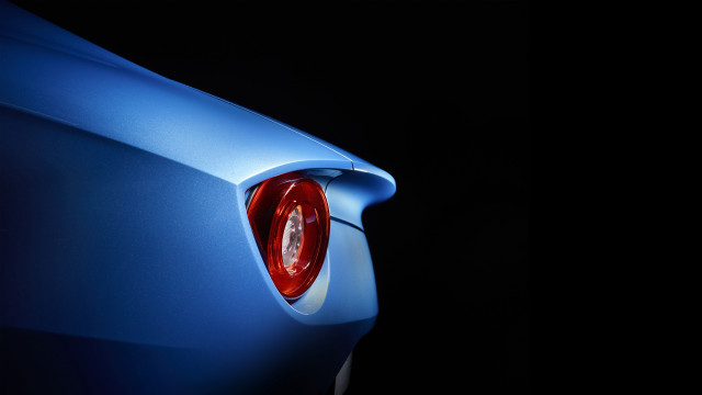Blue car red taillight dark free wallpaper for desktop - medium preview image