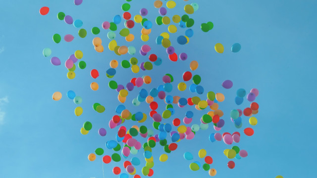 Balloons flying sky clouds cheerful free wallpaper for desktop - medium preview image