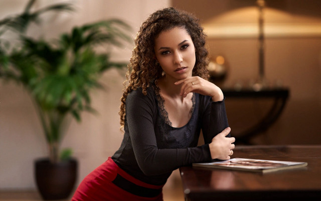 Woman table book plant bokeh free wallpaper for desktop - medium preview image